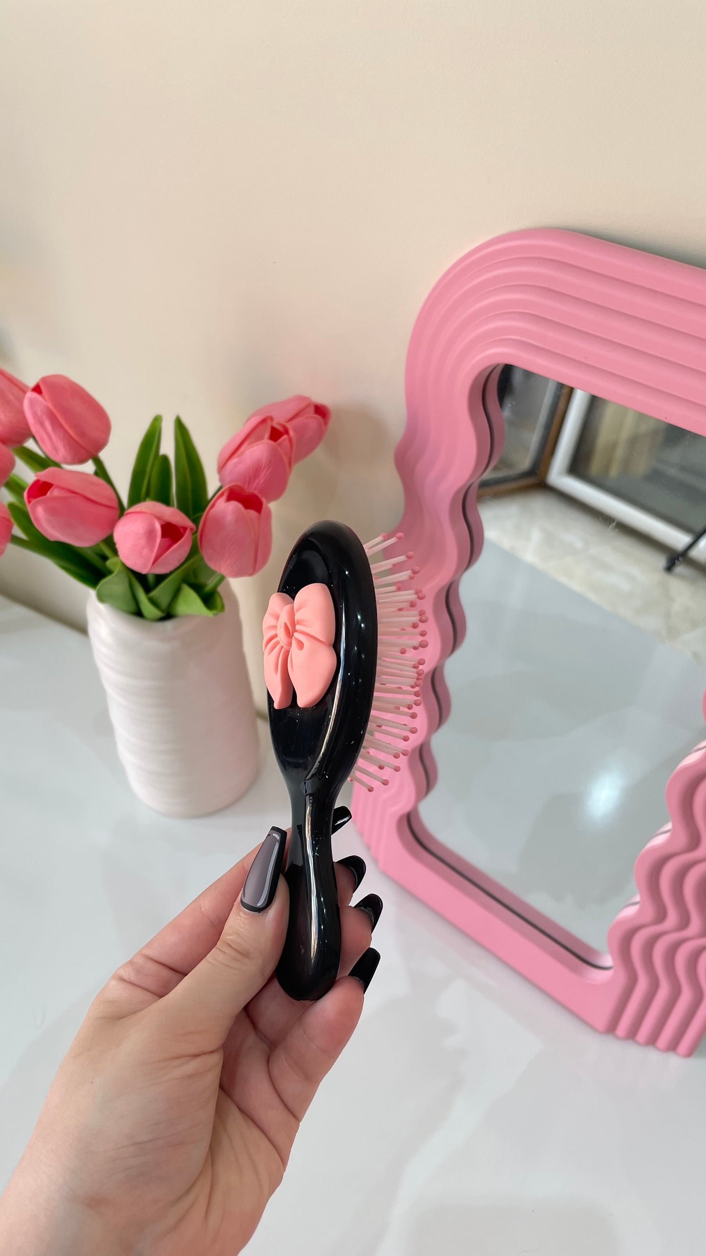 Mini brosse pour les cheveux design noeud